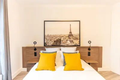 Un ou plusieurs lits dans un hébergement de l'établissement Charming apartment - 1BR-4P - Bastille