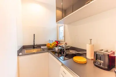 Cuisine ou kitchenette dans l'établissement Charming apartment - 1BR-4P - Bastille