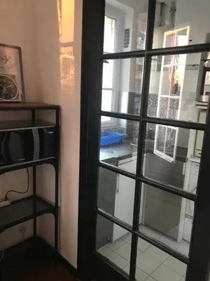 Un ou plusieurs lits dans un hébergement de l'établissement Appart douillet Paris 11