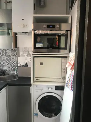 Cuisine ou kitchenette dans l'établissement Appart douillet Paris 11