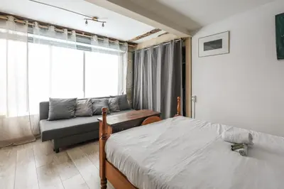 Un ou plusieurs lits dans un hébergement de l'établissement Appartement Ternaux - Welkeys