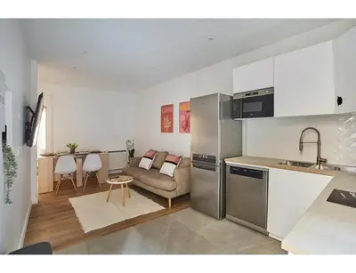 Cuisine ou kitchenette dans l'établissement Apartment Parc des expositions by Studio prestige