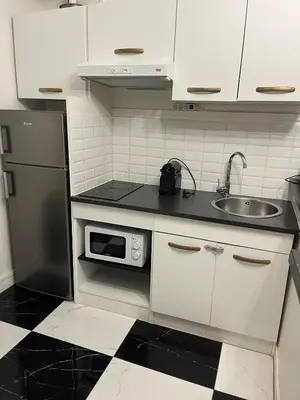 Cuisine ou kitchenette dans l'établissement BLACK & WHITE - CHIC & PETIT MAISON- Pigalle 9eme