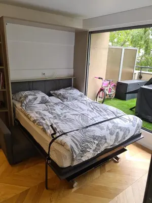 Un ou plusieurs lits dans un hébergement de l'établissement Studio à La Défense (climatisé, parking)