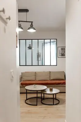 Coin salon dans l'établissement Flex Check in - 4 ppl - Free Parking - AC - Wifi - Metro 7 et 14 à 6 min