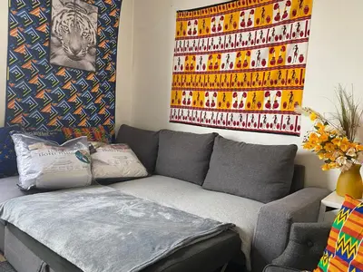 Un ou plusieurs lits dans un hébergement de l'établissement SUPER APPARTEMENT AU COEUR DE MONTMARTRE