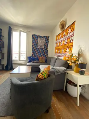 Coin salon dans l'établissement SUPER APPARTEMENT AU COEUR DE MONTMARTRE