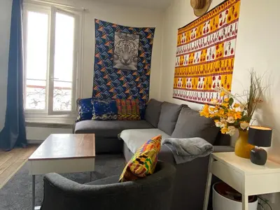 Coin salon dans l'établissement SUPER APPARTEMENT AU COEUR DE MONTMARTRE