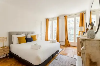 Un ou plusieurs lits dans un hébergement de l'établissement 8P - 3BR Le Marais Spacious - Central - Historic Apt