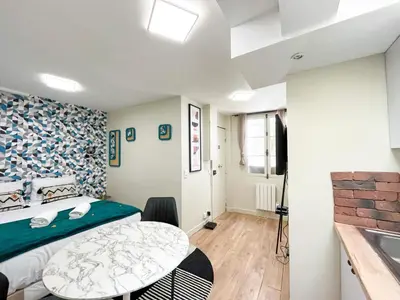 Un ou plusieurs lits dans un hébergement de l'établissement 162 - Urban Studio in Montorgueil