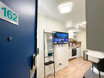 Cuisine ou kitchenette dans l'établissement 162 - Urban Studio in Montorgueil