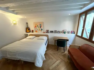 Un ou plusieurs lits dans un hébergement de l'établissement CozyStudioParis-Montmartre-Opera