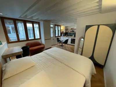 Un ou plusieurs lits dans un hébergement de l'établissement CozyStudioParis-Montmartre-Opera