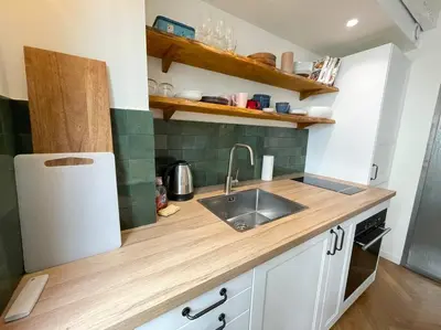 Cuisine ou kitchenette dans l'établissement CozyStudioParis-Montmartre-Opera