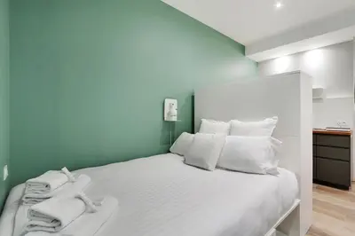 Un ou plusieurs lits dans un hébergement de l'établissement Pick A Flat's Apartment near Eiffel Tower - Allée Marguerite Yourcenar