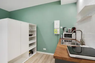 Cuisine ou kitchenette dans l'établissement Pick A Flat's Apartment near Eiffel Tower - Allée Marguerite Yourcenar