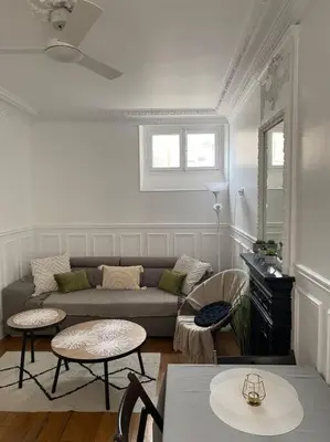 Coin salon dans l'établissement Charmant appartement cosy 2 pièces Paris 15e
