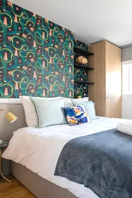 Un ou plusieurs lits dans un hébergement de l'établissement Luxury architect studio near Le Marais