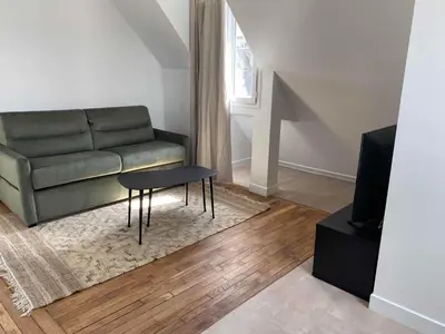 Coin salon dans l'établissement Dauphine - Modern Apartment