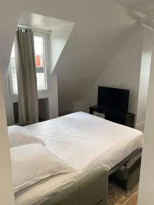 Un ou plusieurs lits dans un hébergement de l'établissement Dauphine - Modern Apartment