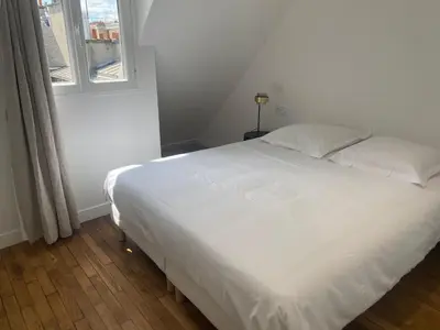 Un ou plusieurs lits dans un hébergement de l'établissement Dauphine - Modern Apartment