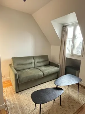 Coin salon dans l'établissement Dauphine - Modern Apartment
