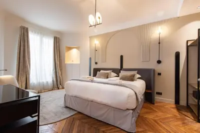 Un ou plusieurs lits dans un hébergement de l'établissement Appartement Élégant & Spacieux - 3BR-6P - Républiq