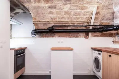 Cuisine ou kitchenette dans l'établissement Appartement 2 chambres Lyonnais