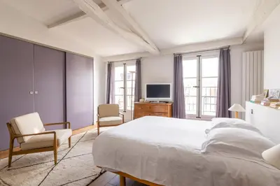 Un ou plusieurs lits dans un hébergement de l'établissement Veeve - Loft Living on Luxembourg
