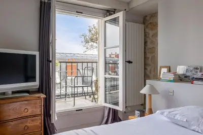 Un ou plusieurs lits dans un hébergement de l'établissement Veeve - Loft Living on Luxembourg