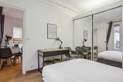 Un ou plusieurs lits dans un hébergement de l'établissement Modern flat in Paris - Heart of XVIème