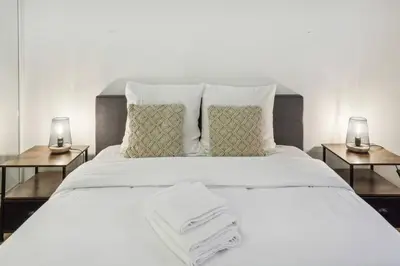 Un ou plusieurs lits dans un hébergement de l'établissement Modern flat in Paris - Heart of XVIème