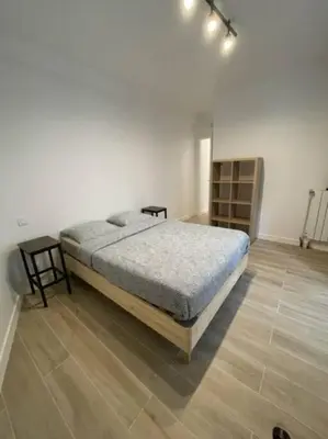 Un ou plusieurs lits dans un hébergement de l'établissement Paris Nordmann superbe appartement 2 pièces