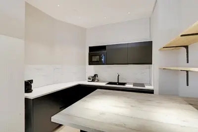 Cuisine ou kitchenette dans l'établissement Pick A Flat's Apartment in Parc Monceau - Boulevard de Courcelles