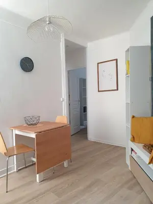 Coin salon dans l'établissement Double-studio 4p Calme 100m métro idéal Séjour Maison examens