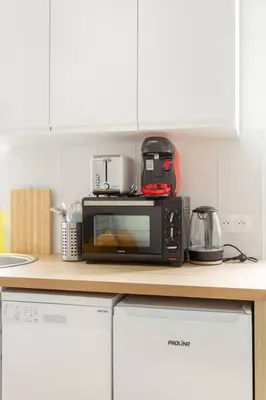 Cuisine ou kitchenette dans l'établissement NidAudonnien
