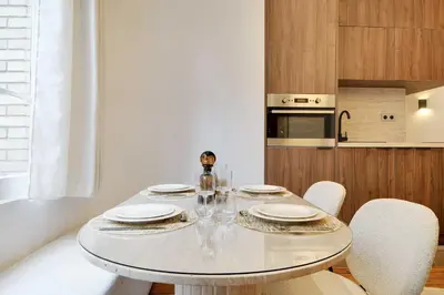 Cuisine ou kitchenette dans l'établissement Chic apartment - 1BR-4P - République