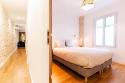 Un ou plusieurs lits dans un hébergement de l'établissement Loft 4 BR Montmartre Pigalle AC by LCC Agency