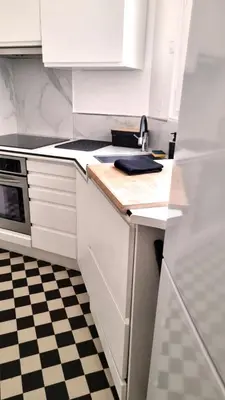 Cuisine ou kitchenette dans l'établissement Sophisticated Gem in the Heart of Paris - 107m2