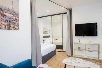 Un ou plusieurs lits dans un hébergement de l'établissement Appartement confortable 1BR-4P - Boulogne-Billancourt