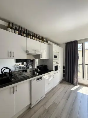Cuisine ou kitchenette dans l'établissement Apartment Like HOME Arc de Triomphe, Champs Élysées, Tour Eiffel