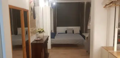 Un ou plusieurs lits dans un hébergement de l'établissement Charming Loft - Tour Eiffel/ Rue Cler