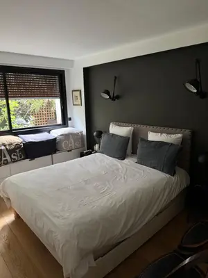 Un ou plusieurs lits dans un hébergement de l'établissement Appartement Design avec Jardin 4 pers 2 Chambres