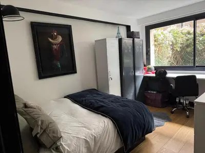 Un ou plusieurs lits dans un hébergement de l'établissement Appartement Design avec Jardin 4 pers 2 Chambres