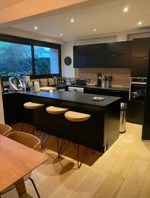 Cuisine ou kitchenette dans l'établissement Appartement Design avec Jardin 4 pers 2 Chambres