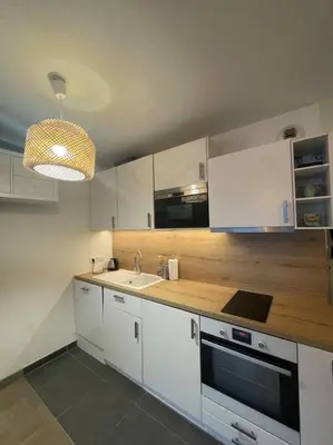 Cuisine ou kitchenette dans l'établissement Studio Design & Cosy avec Parking
