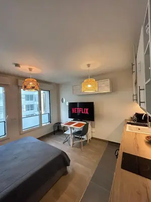 Télévision ou salle de divertissement dans l'établissement Studio Design & Cosy avec Parking