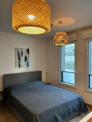 Un ou plusieurs lits dans un hébergement de l'établissement Studio Design & Cosy avec Parking
