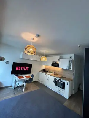 Cuisine ou kitchenette dans l'établissement Studio Design & Cosy avec Parking