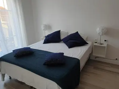 Un ou plusieurs lits dans un hébergement de l'établissement cosy appartment - Clamart Percy Paris